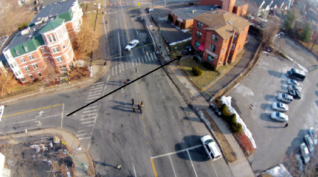 Aerial footage Pedro Rivera shot on Main Street in Hartford on 1 February 2014. The crash vehicle is on the right, parked on the lawn in front of a 3-story brick building.