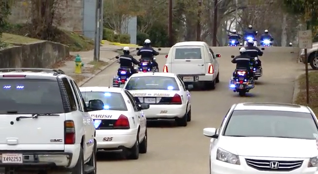 Bordelon's last ride. Traffic came to a standstill and people took off their hats as a sign of respect as the hearse slowly made its way to Alexandria Memorial Gardens, about 18 miles away.