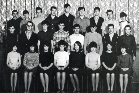 1967: Grade 11-A at Campbellton High. John McDonald [the tallest student] stands next to Brian MacNeish. Just in front of McDonald, stands Ken Chambers [with checkered shirt]. 