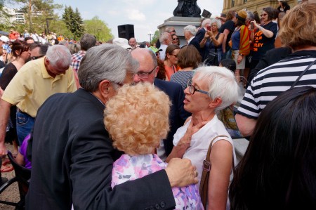 Former Edmonton Mayor Jan Reimer greets former NDP MLA Alex MacEachern.
