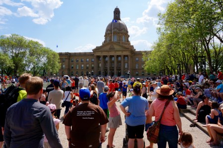 Click to enlarge to read the man's shirt