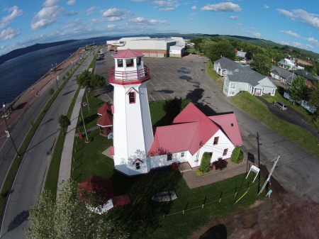 Campbellton's waterfront; the lighthouse is in fact a hostel.