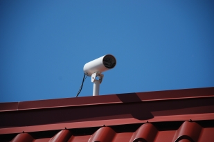 This surveillance camera was facing the parking lot. Photo taken on 23 June 2011. I do not know if this was the same camera back in July 2005.
